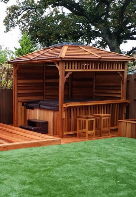 Cedar decking stone cladding seating gazebo hot tub 1