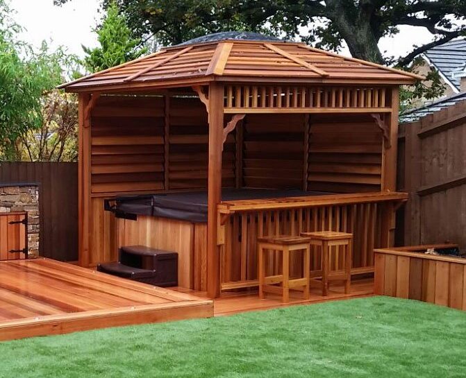 Cedar decking stone cladding seating gazebo hot tub 1